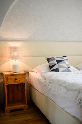 Postel nebo postele na pokoji v ubytování Hotel & Garden U Holubů