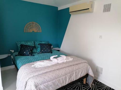 Postel nebo postele na pokoji v ubytování Villa La Caz des 7 cocotiers - Piscine & Plages à Boucan