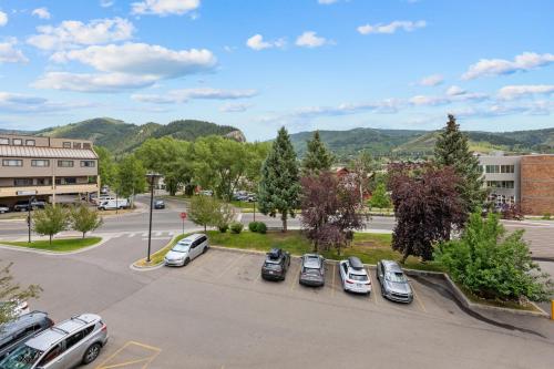 a parking lot with a bunch of cars parked at The Christie Lodge – All Suite Property Vail Valley/Beaver Creek in Avon