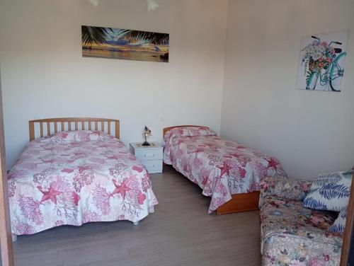 Кровать или кровати в номере Casa Vacanze da Giovanna