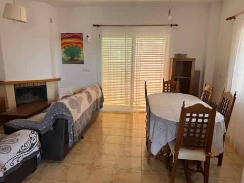 Ένα ή περισσότερα κρεβάτια σε δωμάτιο στο La Casita de Blanca