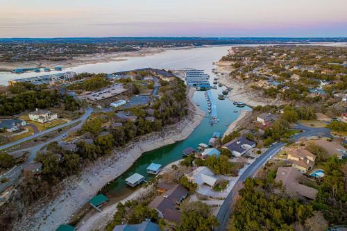 an aerial view of a river and a city at Waterfront Home on Lake Travis in Lakeway