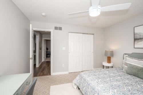 a bedroom with a bed and a ceiling fan at Crittenden Ark Haven in Crittenden