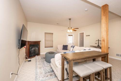 a living room with a couch and a table at Crittenden Ark Haven in Crittenden