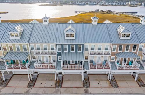 an aerial view of a house with a blue roof at Hidden Paradise - Coastal Views in Ocean View