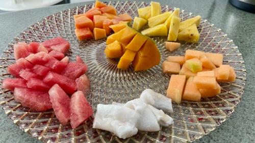 a glass plate with fruit on a table at La Romantica in Contadora