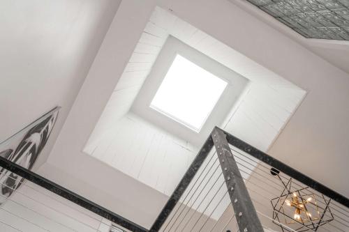 a skylight in the ceiling of a building at The Heart of Madison Suites in Covington