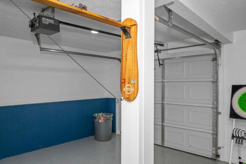 a room with a garage door with a skateboard on it at The Restful Ark in Crittenden
