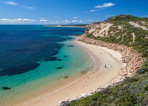 an aerial view of a beach on a cliff at SAUNA & ICE BATH! - Your Health Retreat Escape in Capel Sound