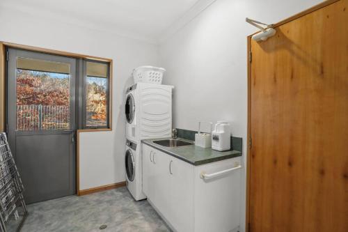 Kuchyň nebo kuchyňský kout v ubytování Coronet View Residence