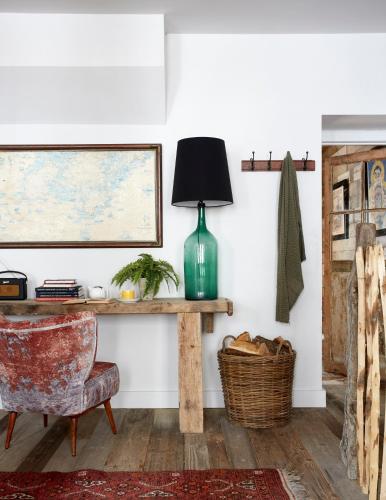 a desk with a lamp and a chair in a room at Artist Residence Cornwall in Penzance