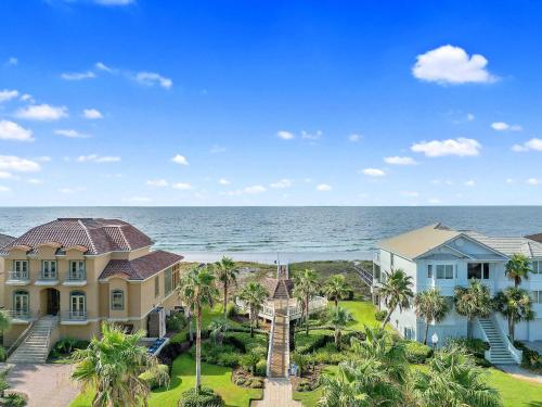 an aerial view of a house and the ocean at Beach Access with Elevator & FREE Activities in Gulf Shores