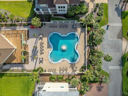 an overhead view of a pool at a resort at Beach Access with Elevator & FREE Activities in Gulf Shores