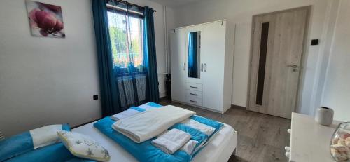 Katil atau katil-katil dalam bilik di Nagcsaládos Rózsa Apartman