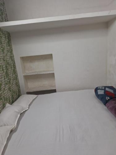Postel nebo postele na pokoji v ubytování singh homestay