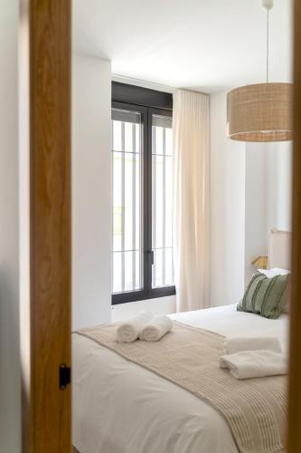 Postel nebo postele na pokoji v ubytování Casa Rural con piscina privada en casco urbano de Náquera Botigueta 25
