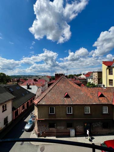 a view of a city with roofs of buildings at Apartament Ratuszowy in Cieszyn