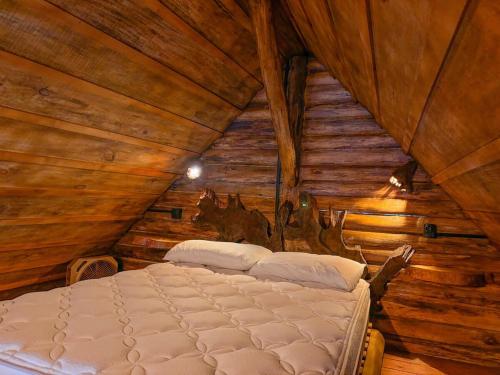 Postel nebo postele na pokoji v ubytování Cabana do Lago