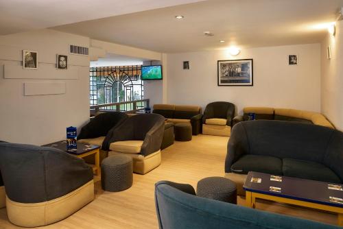 Χώρος καθιστικού στο Cheerfulway Minichoro Apartamentos