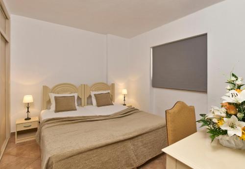 Кровать или кровати в номере Cheerfulway Minichoro Apartamentos
