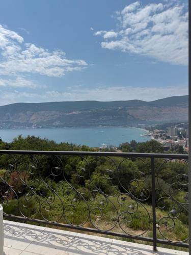 a view of a lake from a balcony at Herceg Novi Sunny Hill Apartment 