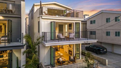 an aerial view of a house with a balcony at Beach Paradise - Stunning 3-Story in Long Beach in Long Beach