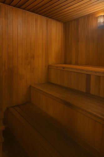 a wooden sauna with wooden shelves in it at BOOK A FLAT Alameda Lorena Jardins in Sao Paulo