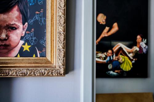 a close up of two framed photographs of a woman at Most Art Boutique Hostel in Leiria