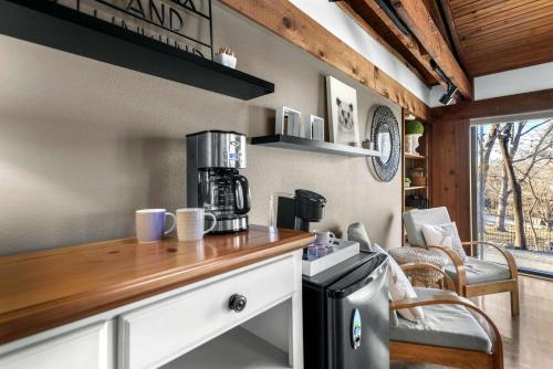 a kitchen with a counter with a coffee maker at Cedar Nest - Experience Ozark Magic in Sunrise Beach in Sunrise Beach