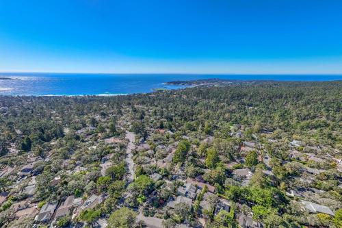 an aerial view of a neighborhood with the ocean at Snuggle Inn - A Romantic Retreat in Carmel