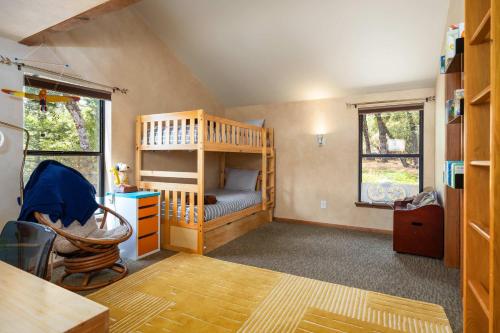 a small room with a bunk bed and a desk at Happy Days Retreat with Private Pool in Bass Lake Annex