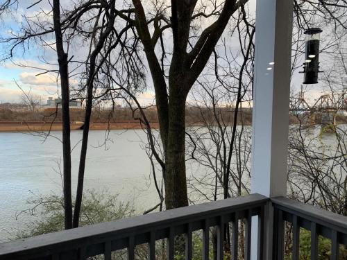 a view of a river from the porch of a house at Riverfront Condo in DT in Nashville