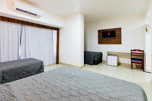 Кровать или кровати в номере El Aram Beach & Convention