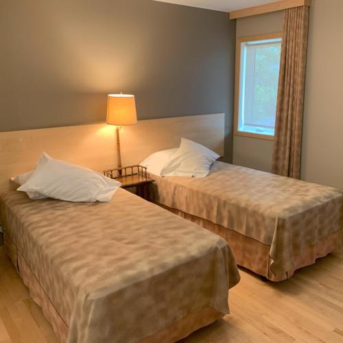 Ένα ή περισσότερα κρεβάτια σε δωμάτιο στο Aspen Woodlands Bed and Breakfast