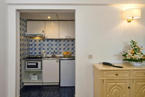 Η κουζίνα ή μικρή κουζίνα στο Cheerfulway Minichoro Apartamentos