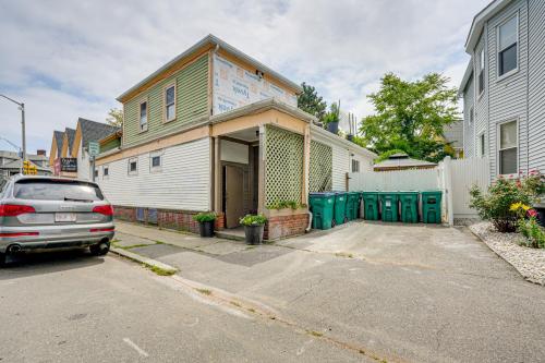 a car parked in front of a house at 5 Mi to Salem! Lynn Apt By the Sea with Hot Tub in Lynn