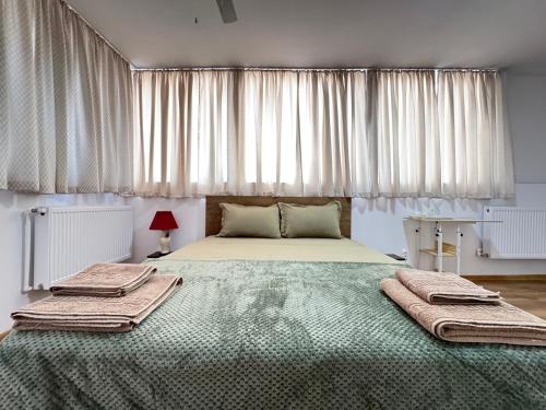 Postel nebo postele na pokoji v ubytování Boutique apart - hotel Lacoste