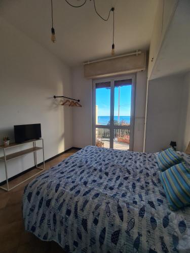 Ένα ή περισσότερα κρεβάτια σε δωμάτιο στο La finestra sul Mare