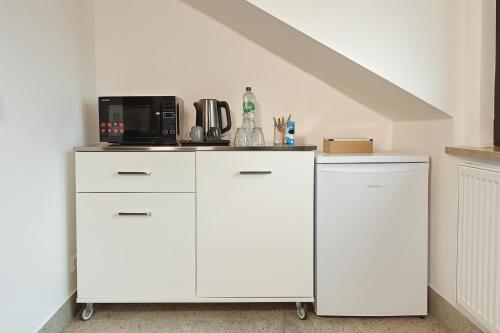 3 ROOMS - Zimmervermietung nähe Flughafen BER - gratis WLAN, Parken & Netflix photo 28