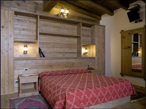 Ένα ή περισσότερα κρεβάτια σε δωμάτιο στο Hotel Avio