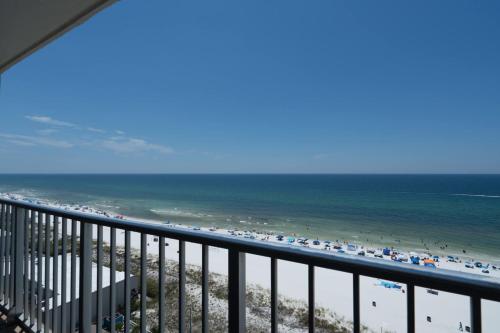 a view of the beach from the balcony of a condo at 1BR Sleeps 5 at The Summit with Ocean Front Views in Panama City Beach