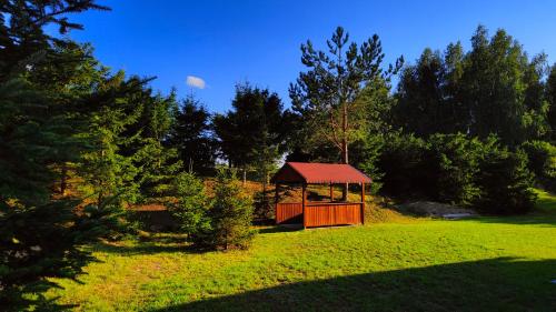 Κήπος έξω από το Biały Domek Nielbark - Agroturystyka