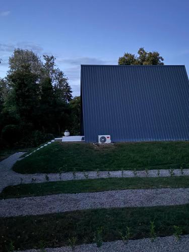a building with a speaker on the side of it at Villa Natura in Bosanska Gradiška