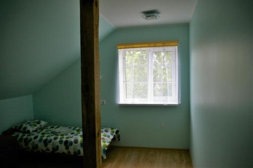 Postel nebo postele na pokoji v ubytování Kagu Hostel