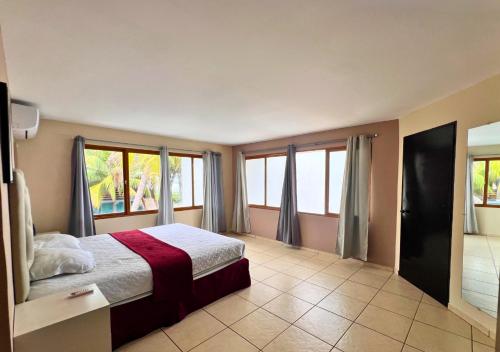 En eller flere senge i et værelse på Quinta del Carmen, Playa San Diego