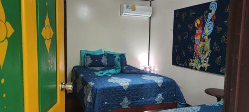 Letto o letti in una camera di Cabinas Tortuguero