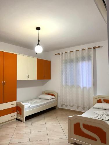 Postel nebo postele na pokoji v ubytování Tranquila House