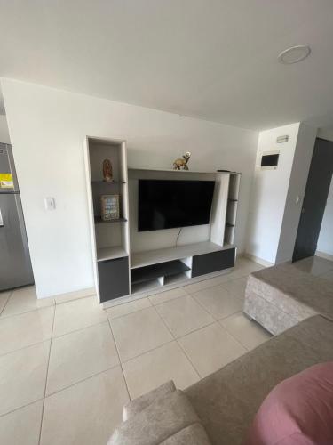 Televisyen dan/atau pusat hiburan di URBAN Apartamento