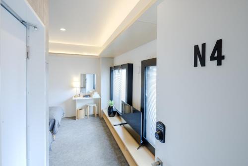 Televisyen dan/atau pusat hiburan di re by hotel wheat