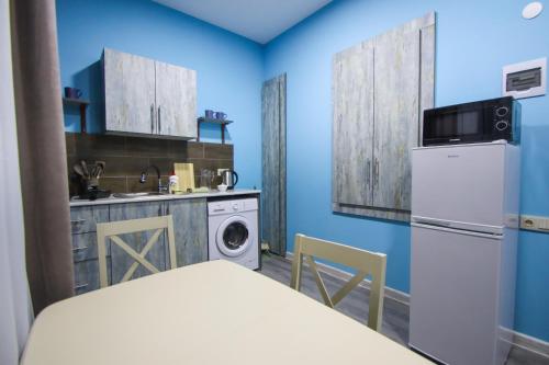 Kuchyň nebo kuchyňský kout v ubytování Calm Home Apartment